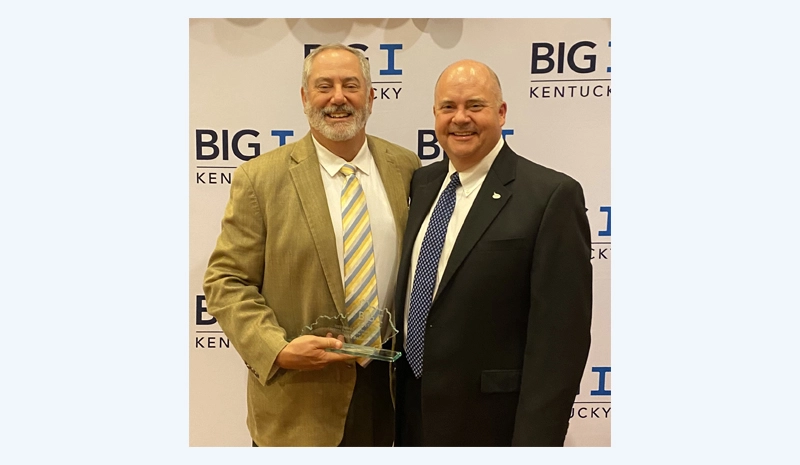 Acuity Territory Director John Bell (left) received the 2023 Buford T. McIntosh Company Person of the Year Award from Big I Kentucky, presented by Ison Insurance Agency President John Ison.  