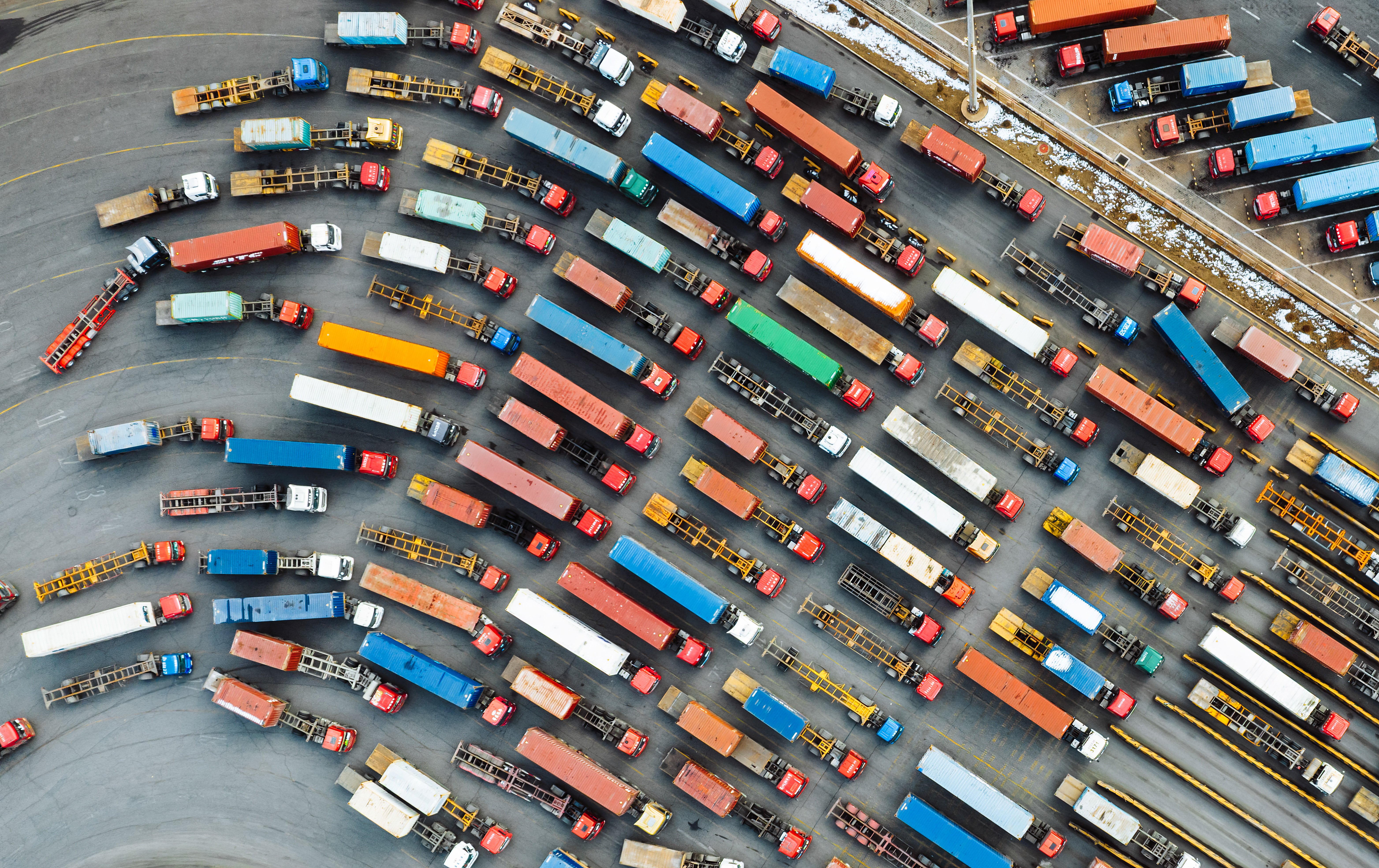 Aerial View of Trucks Entering Container Terminal