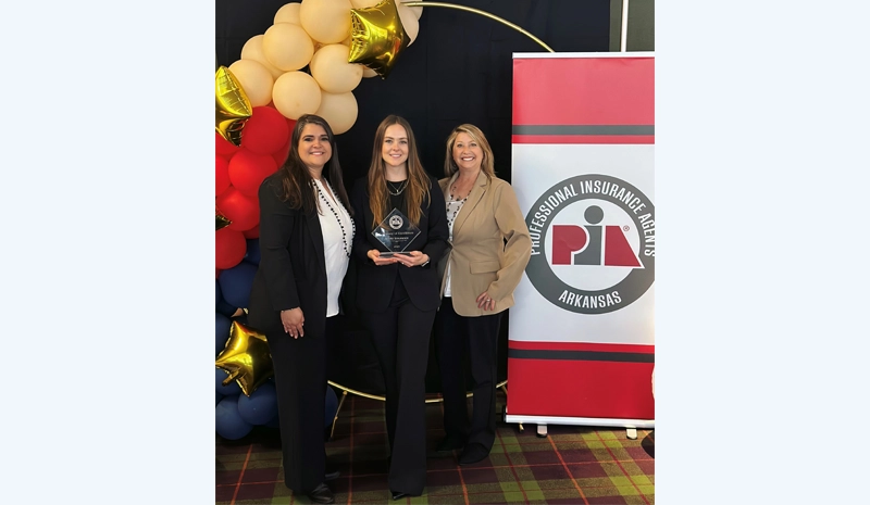 Acuity Commercial Field Underwriter Annette LaRue, Arkansas Territory Director Courtney Fenske, and General Manager-Distribution Susan Jones accept Acuity’s Company of Excellence Award from the Professional Insurance Agents (PIA) of Arkansas.