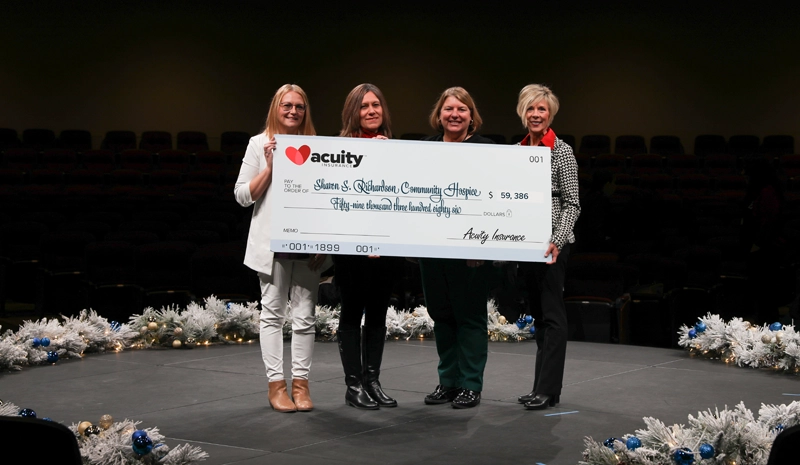 Sharon S. Richardson: Sara Weber, Charmaine Conrad, Tracy Cinealis, and Julie Steinert from Sharon S. Richardson Community Hospice accept a check for nearly $60,000 from Acuity.